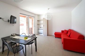 Wohnraum mit 1 Schlafsofa Villa Paradiso